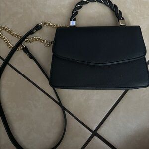 Cute black handbag and crossbody!